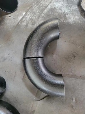 O círculo os encaixes de cotovelo do aço carbono de um ângulo de 90 graus suporta de alta pressão